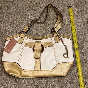 NWT Born O Concept 3 section purse with lots of zipper and non-zipper pockets.